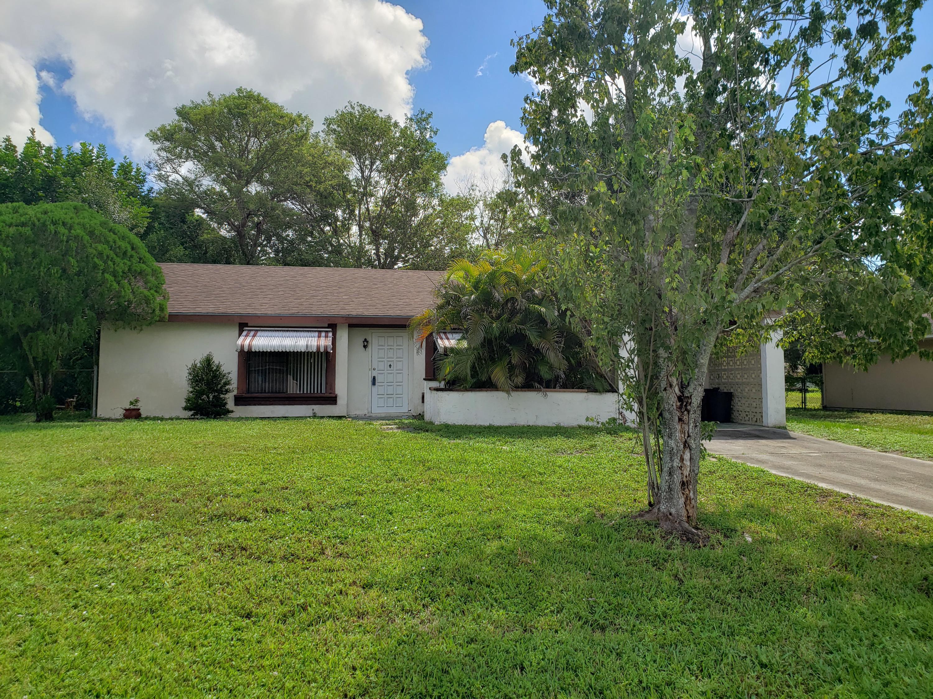 Property Photo: 244 SW Kimball Circle FL 34953