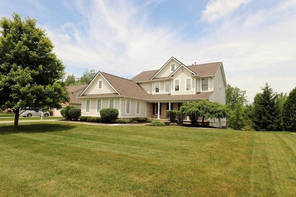 Property Photo:  9170 Hidden Oaks Drive  MI 48439- 