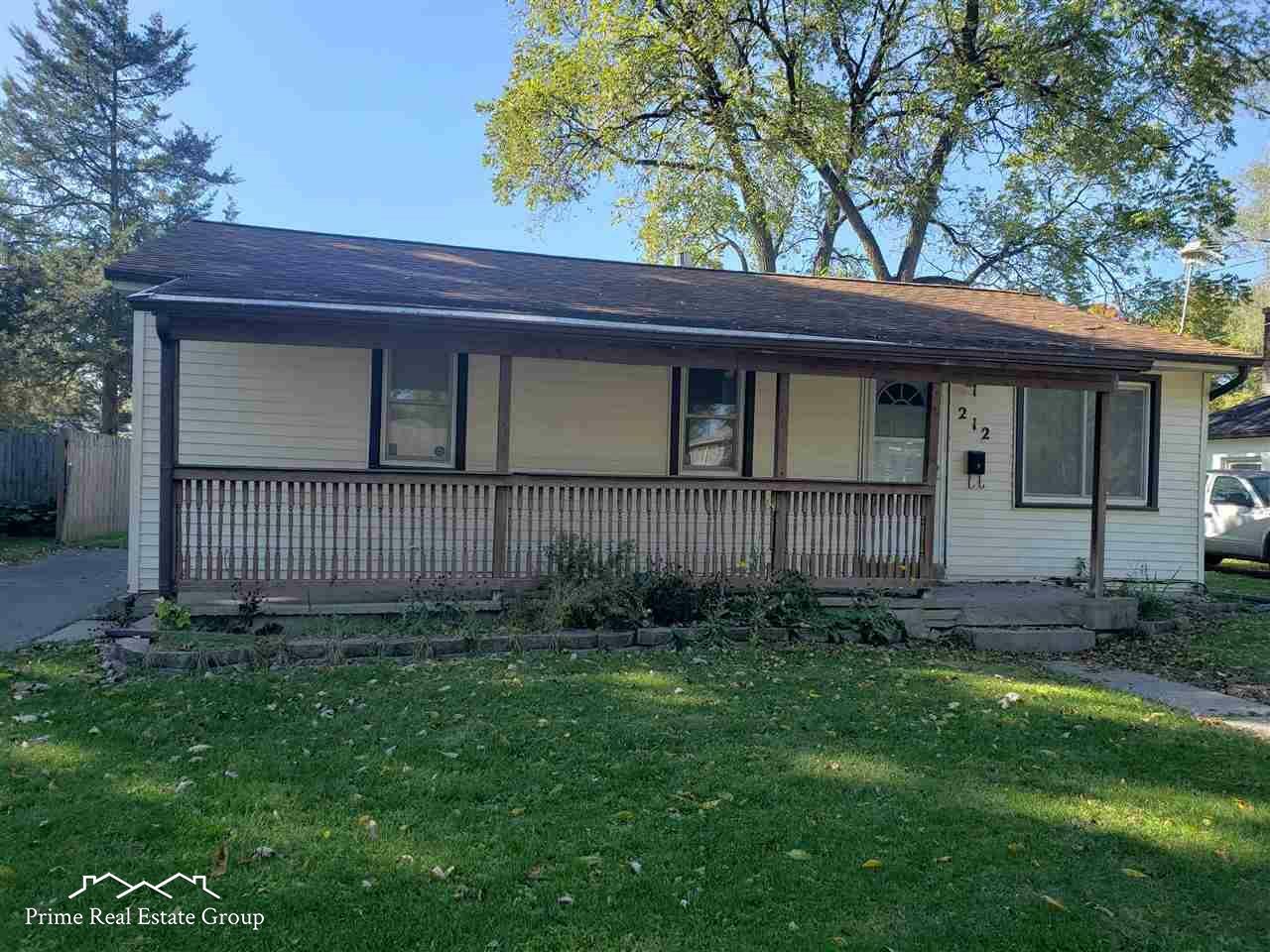 Property Photo:  212 Holmes  MI 48429 