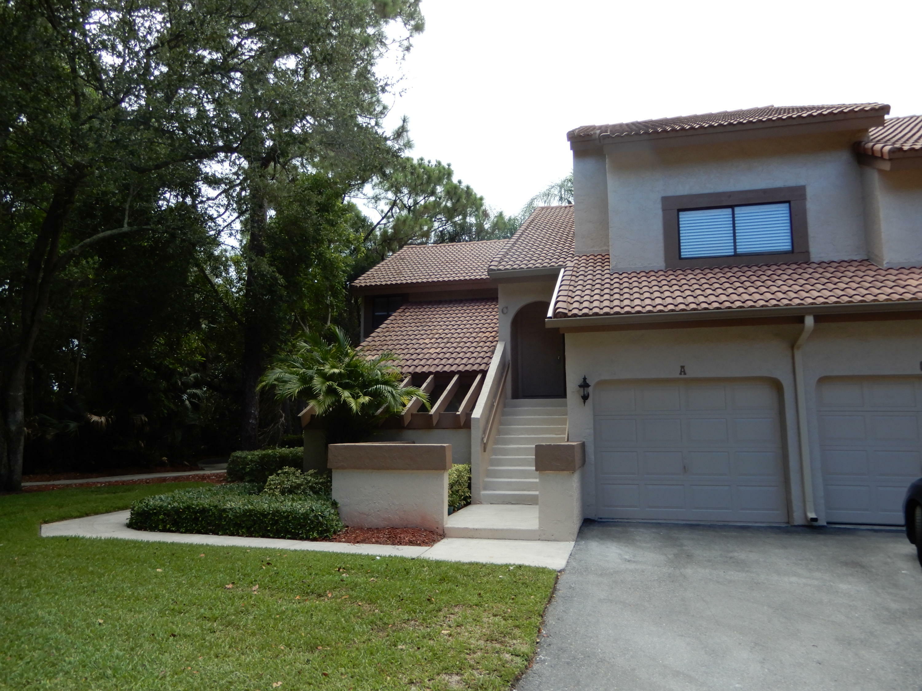 Property Photo:  5730 Coach House Circle C  FL 33486 