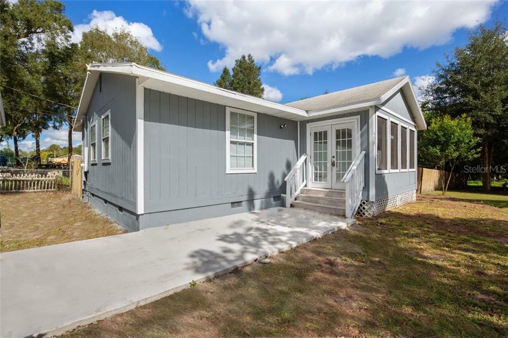 Property Photo: 499 W Beresford Road FL 32720