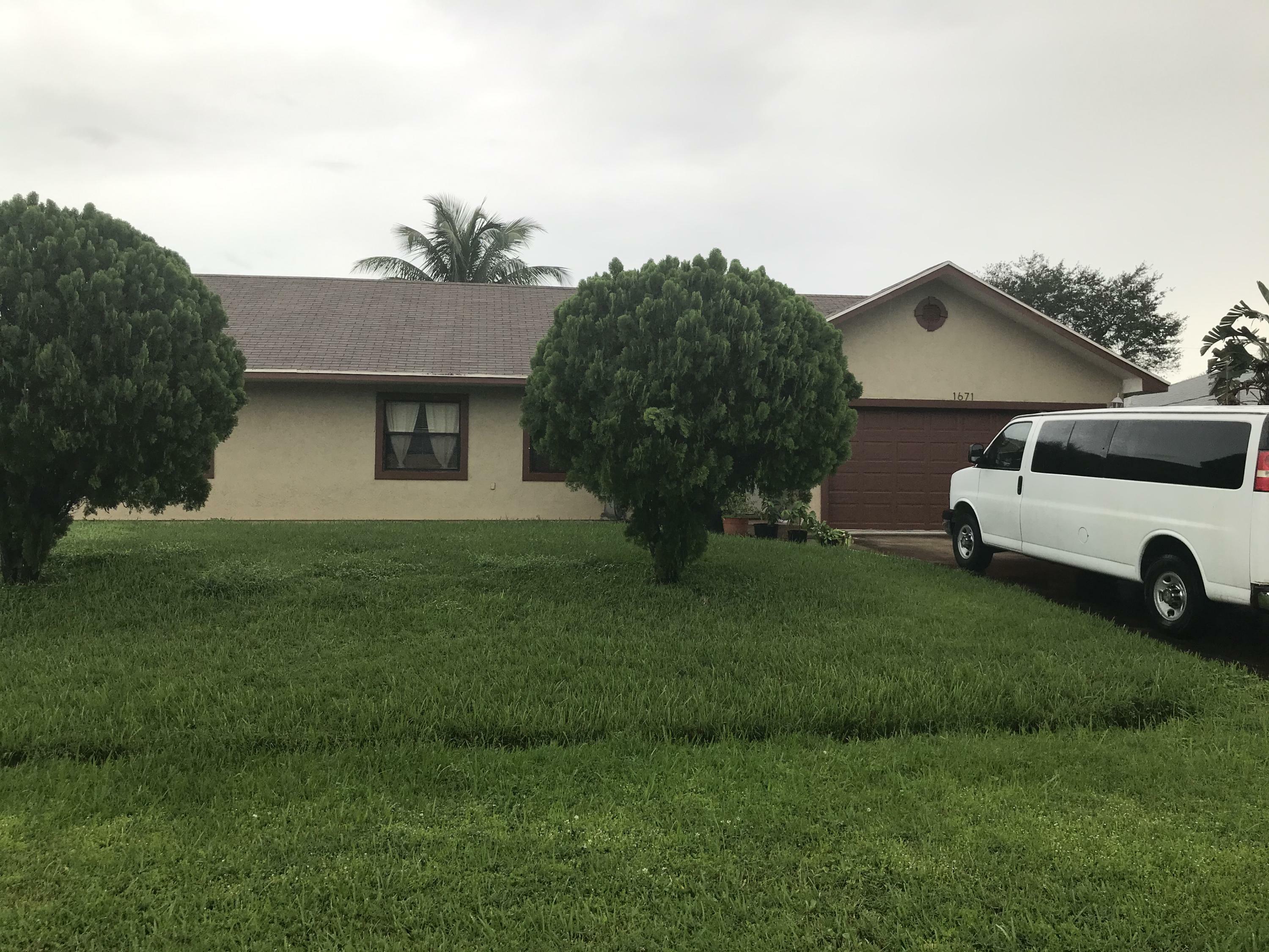 Property Photo:  1671 SW Mistletoe Street  FL 34953 