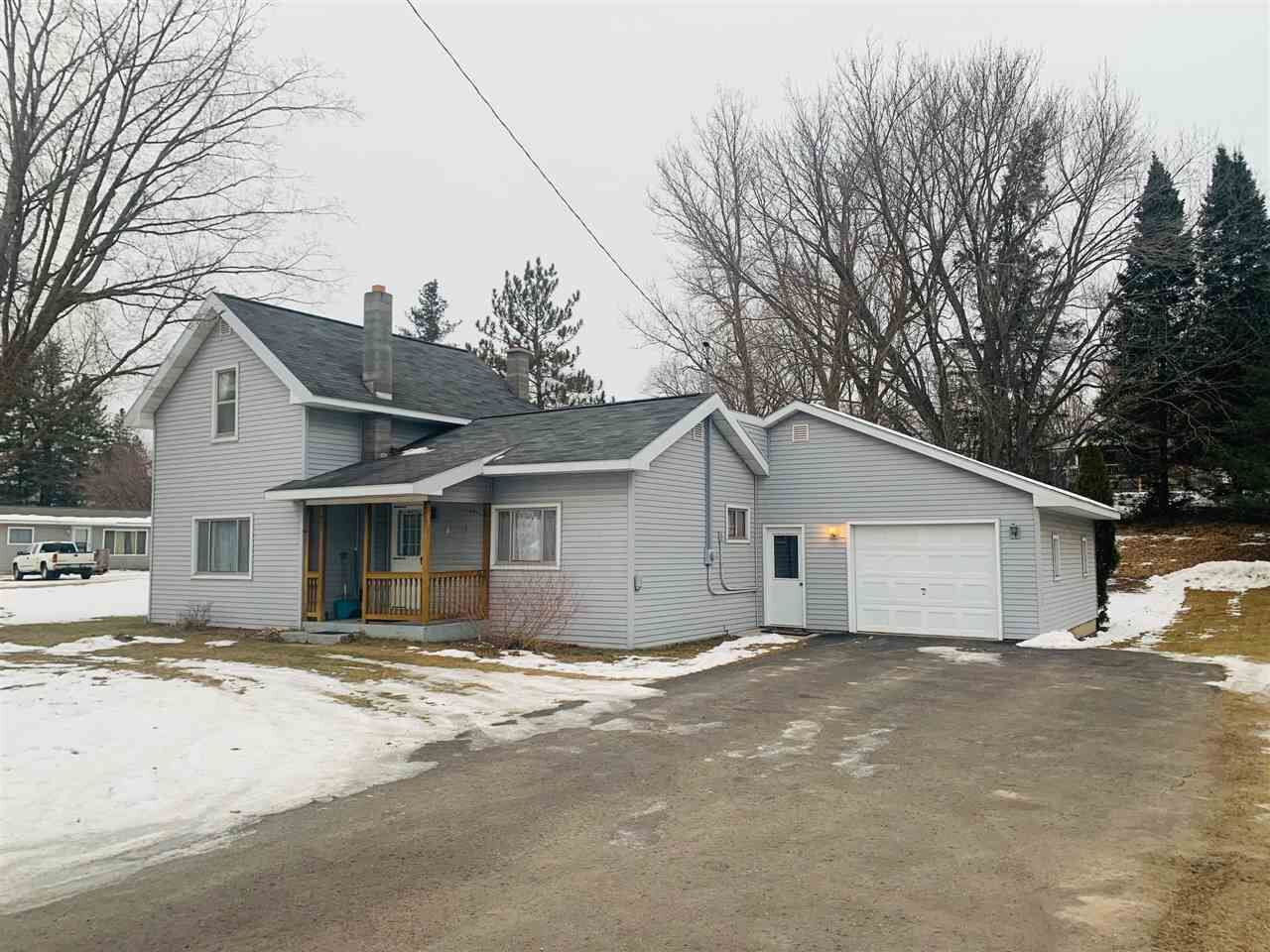 Property Photo:  501 State  MI 49727 