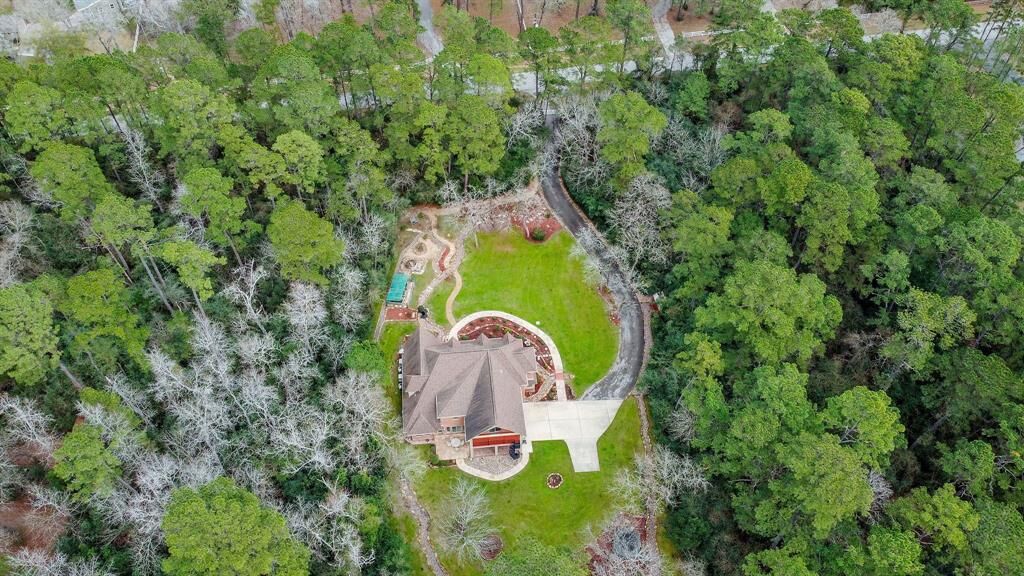 Property Photo:  12 W Lake Forest Court  TX 77384 