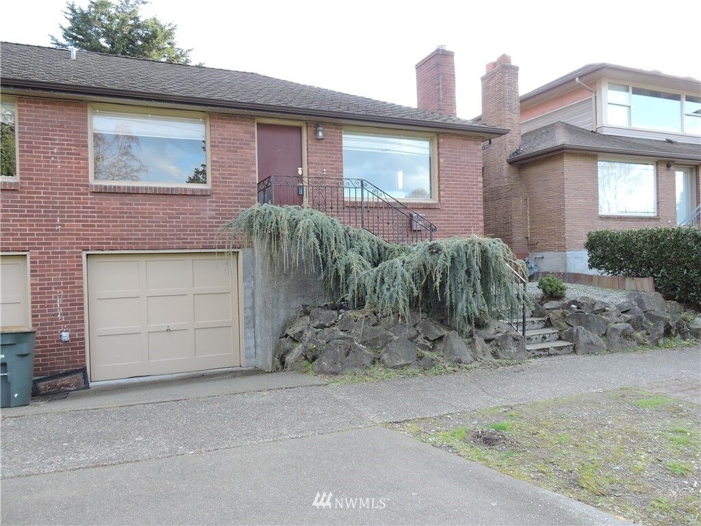 Property Photo:  6119 SW Spokane Street  WA 98116 