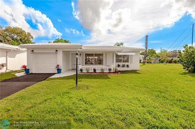 Property Photo:  2450 NW 3rd Ave  FL 33064 