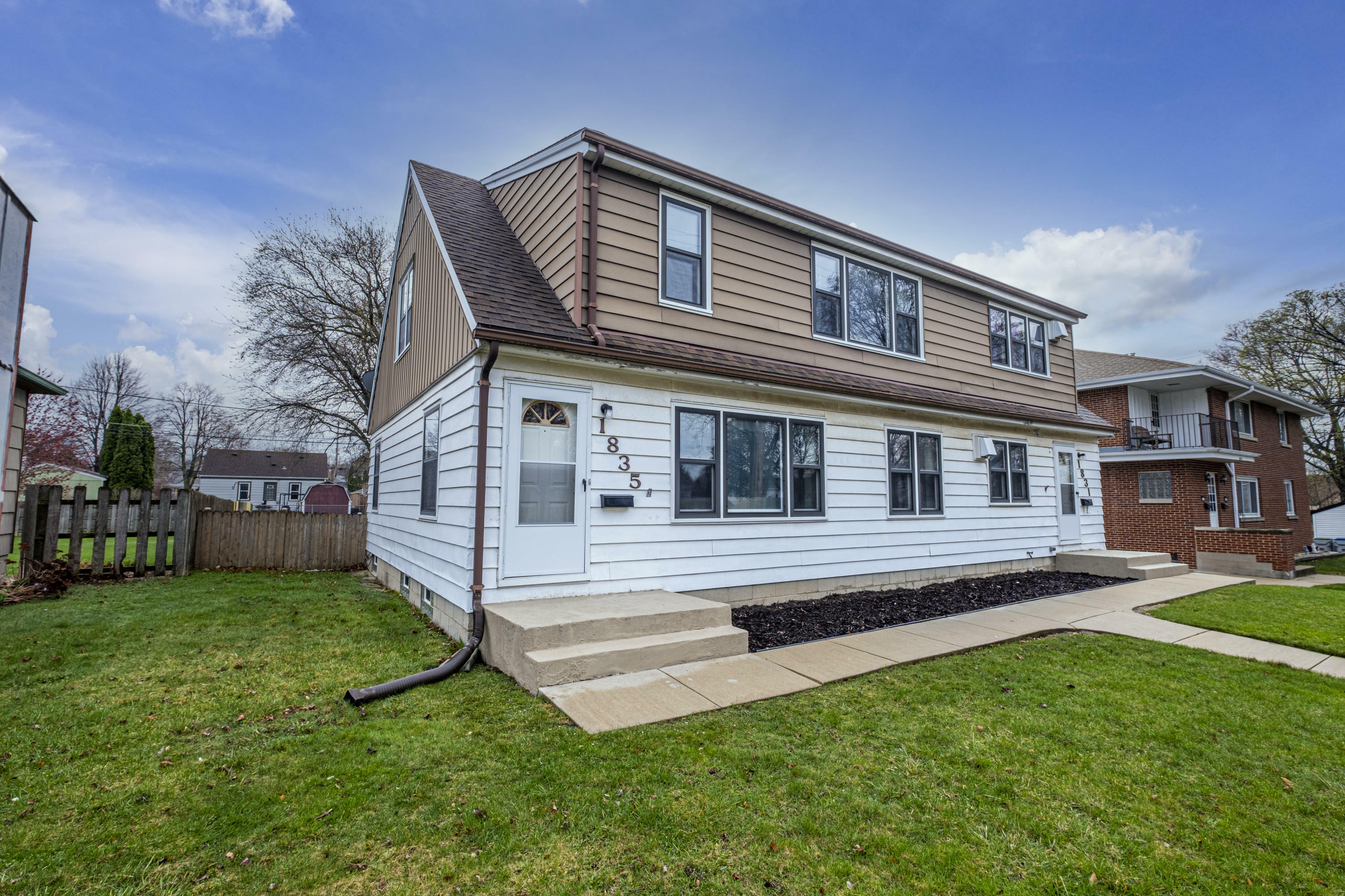 Property Photo:  1835 E Tripoli Ave 1831  WI 53207 