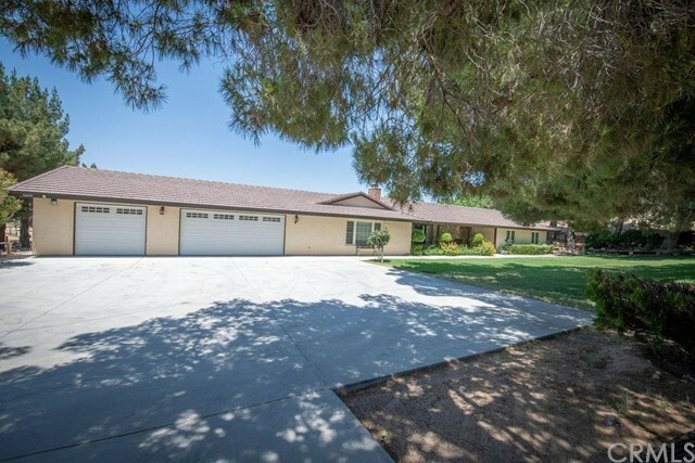 Property Photo:  14140 Riverside Drive  CA 92307 