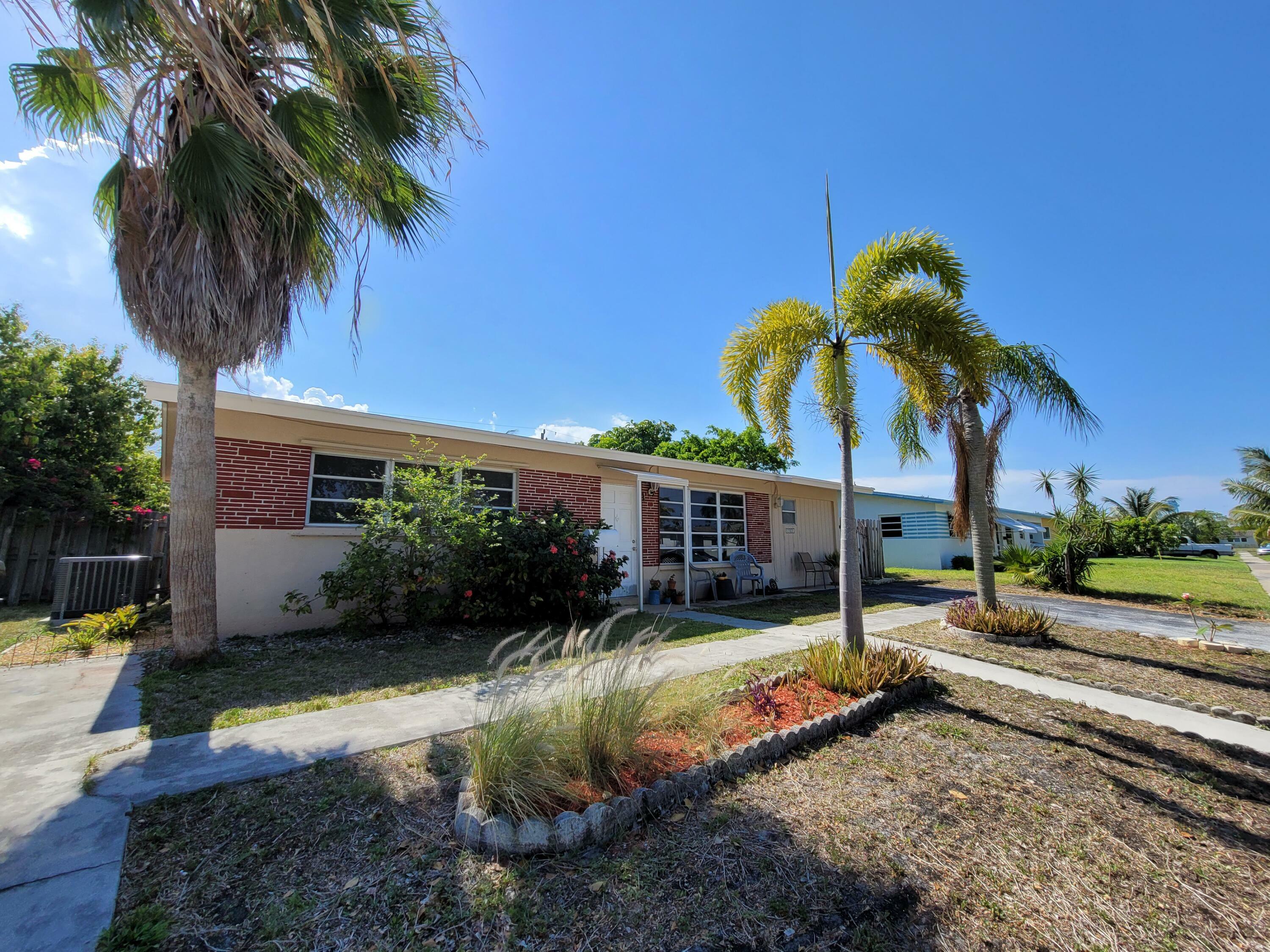 Property Photo:  1321 SE 1st Avenue  FL 33441 