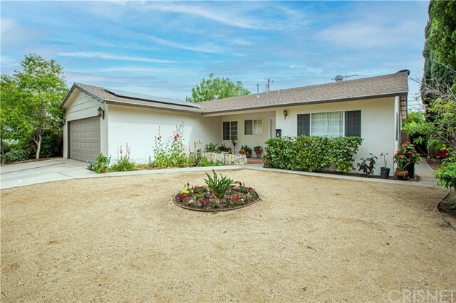 Property Photo:  23920 Hartland Street  CA 91307 