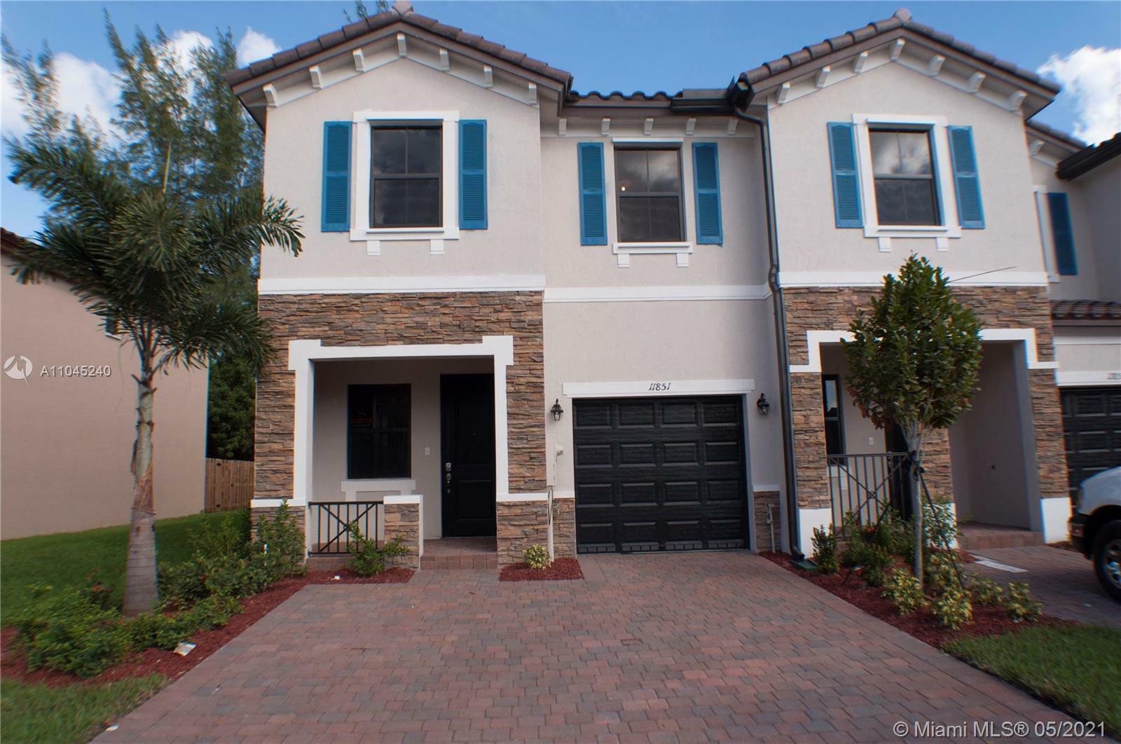 Property Photo:  11851 SW 150th Pl 11851  FL 33196 