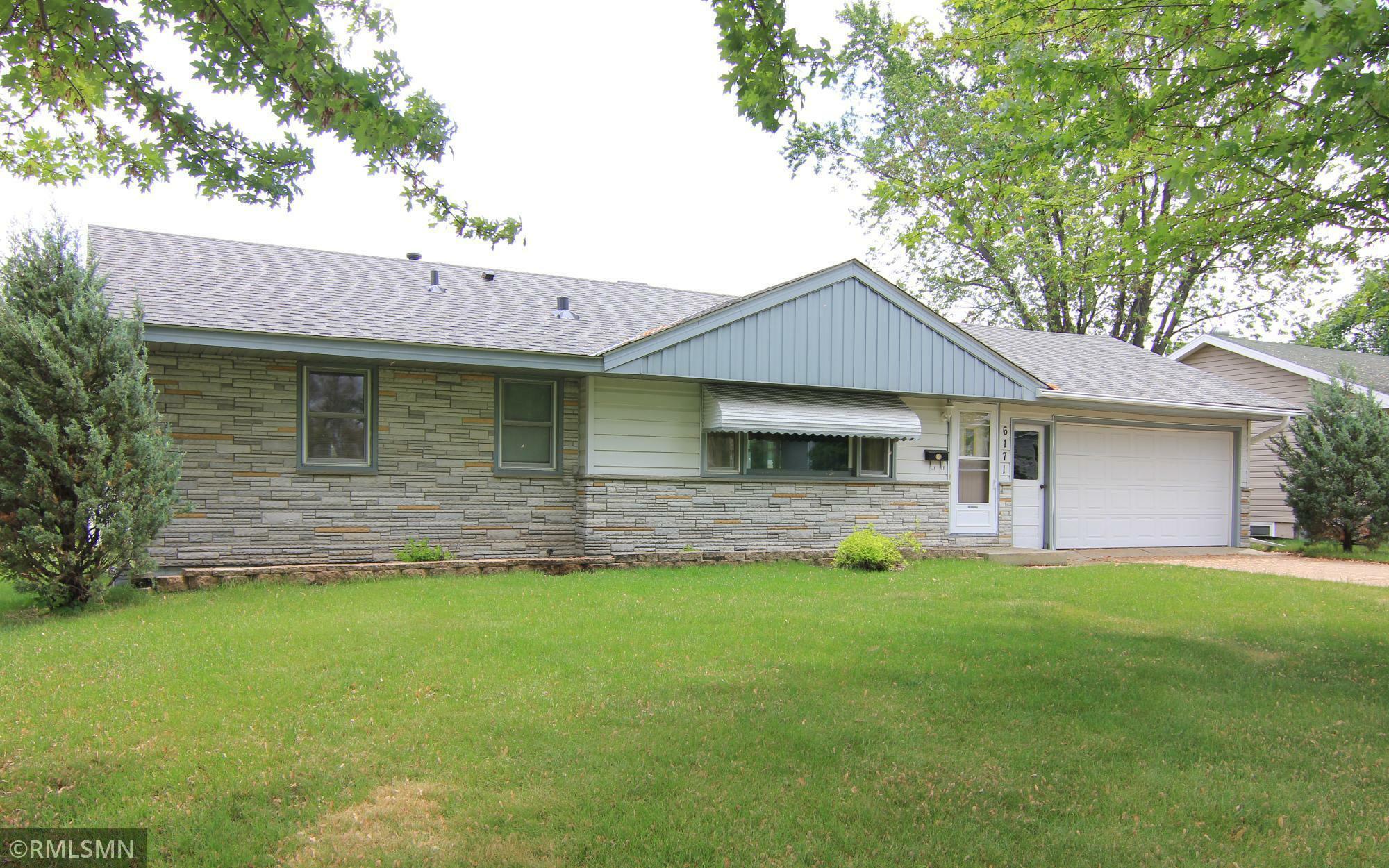 Property Photo:  6171 5th Street NE  MN 55432 