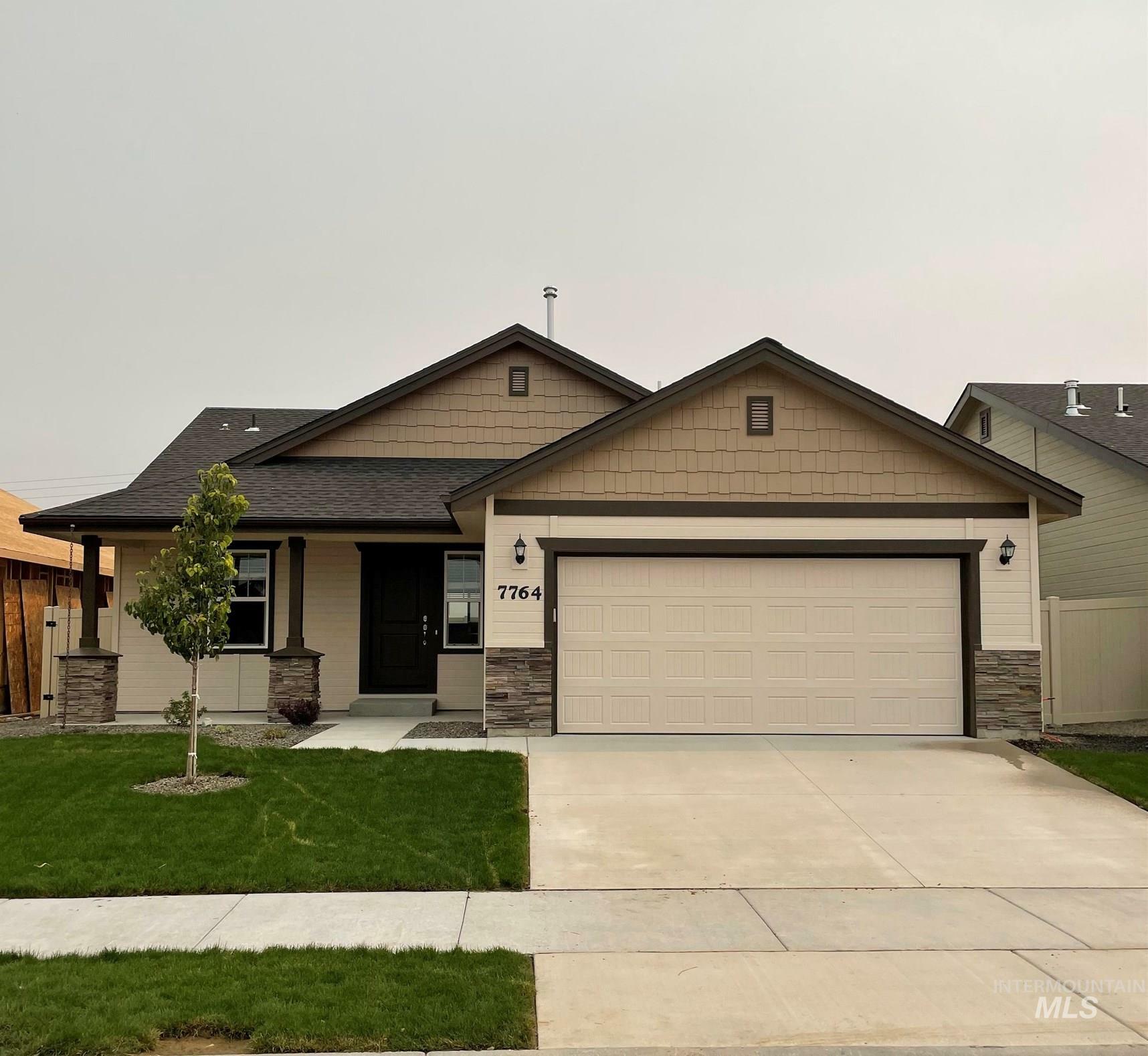 Property Photo:  7764 S Boysenberry Ave.  ID 83709 