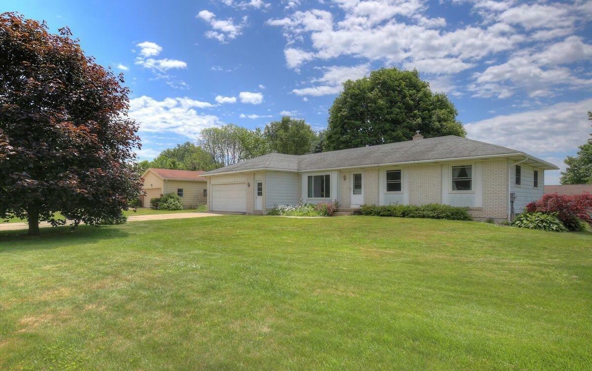 Property Photo:  4120 Sand Creek Drive NW  MI 49544 