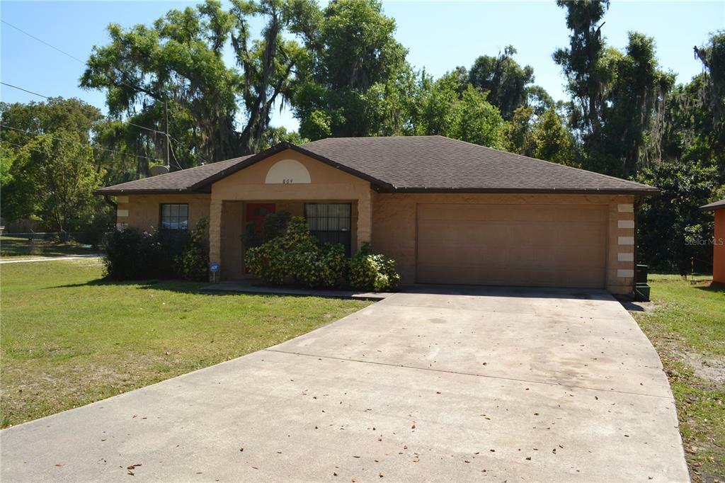 Property Photo:  864 E Voorhis Avenue  FL 32724 