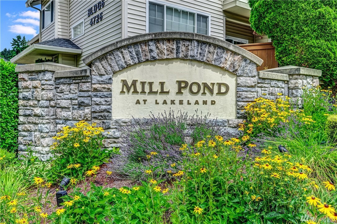 Property Photo:  4724 Mill Pond Dr SE 703  WA 98092 