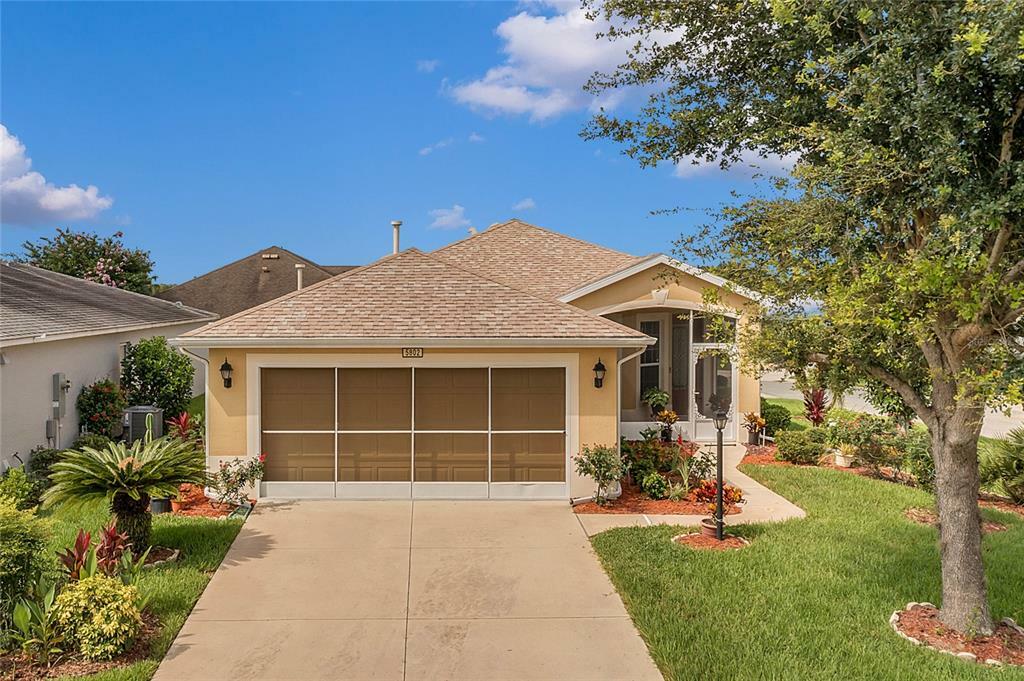 Property Photo: 5802 Woodland Moss Way FL 34748