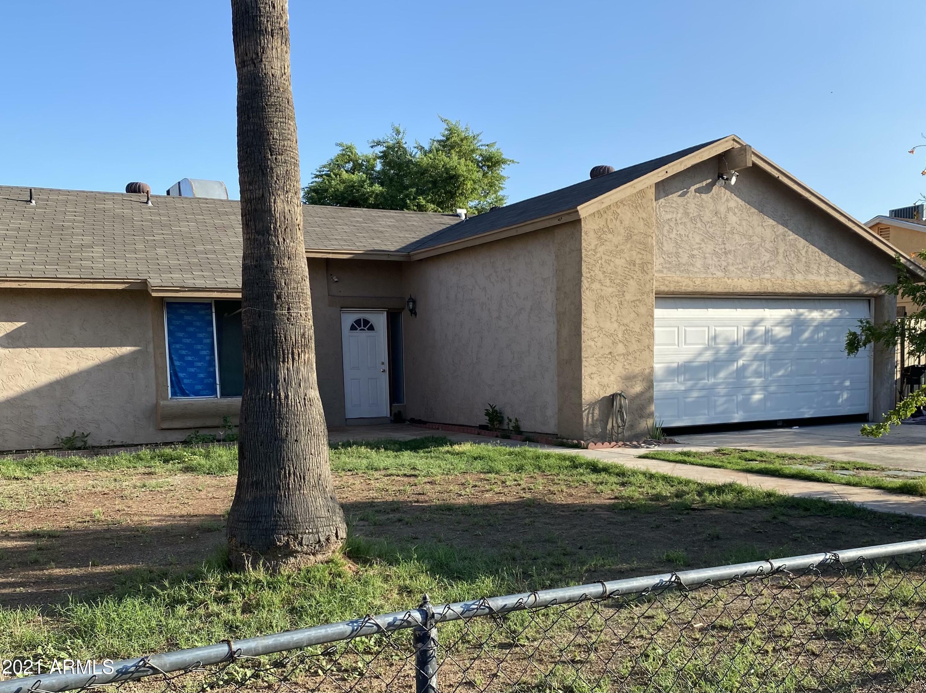 Property Photo:  7559 W Elm Street  AZ 85033 