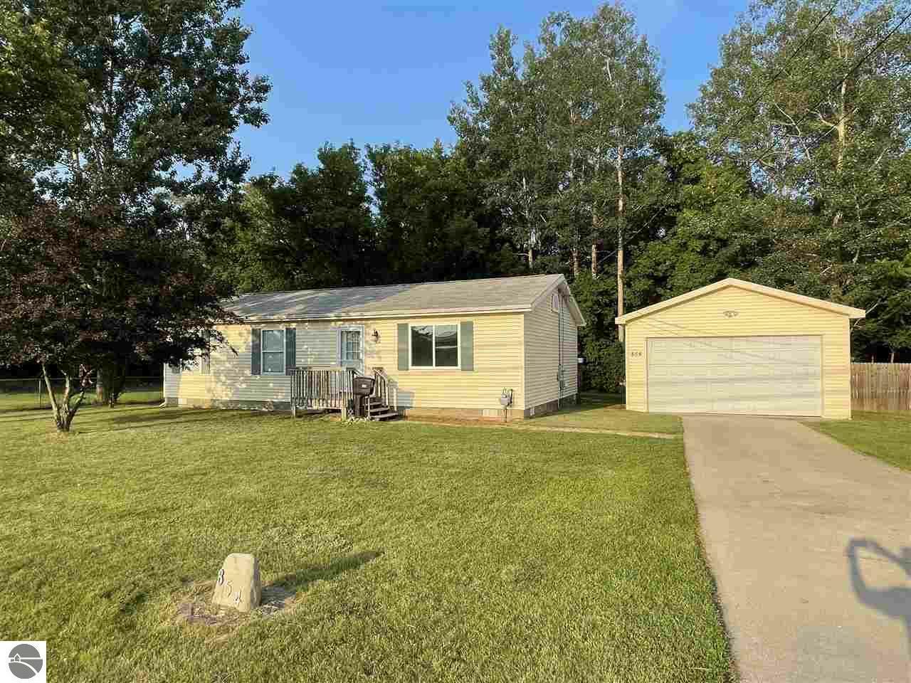 Property Photo:  854 Cedar  MI 48617 