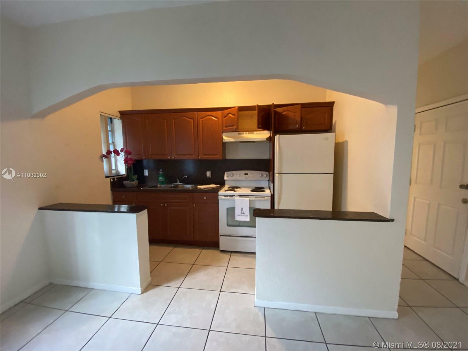 Property Photo:  313 N Krome Ave A  FL 33030 