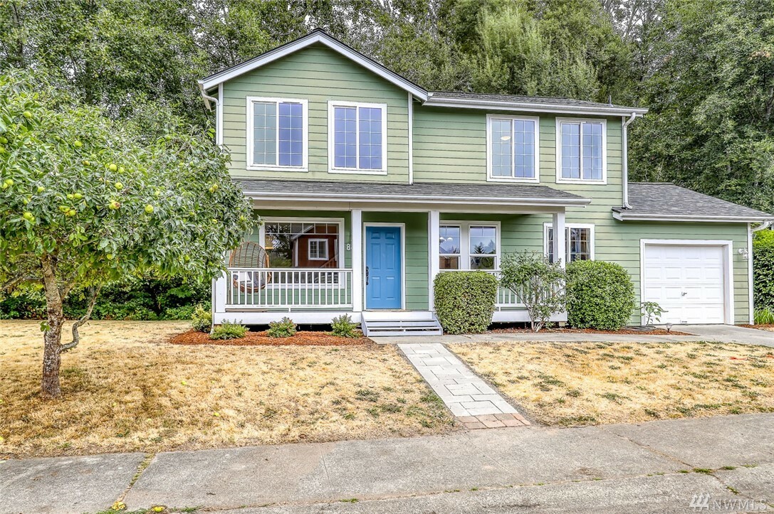 Property Photo:  840 Strawberry Lane NW  WA 98110 