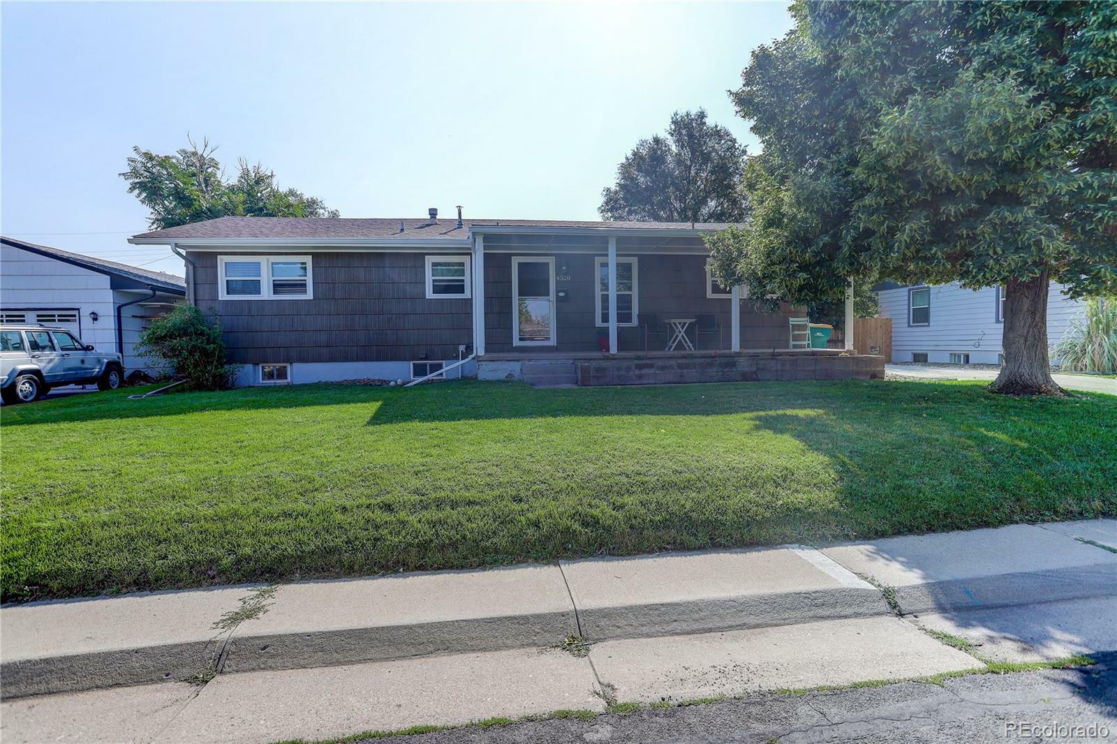 Property Photo: 4320 S Kalamath Street CO 80110