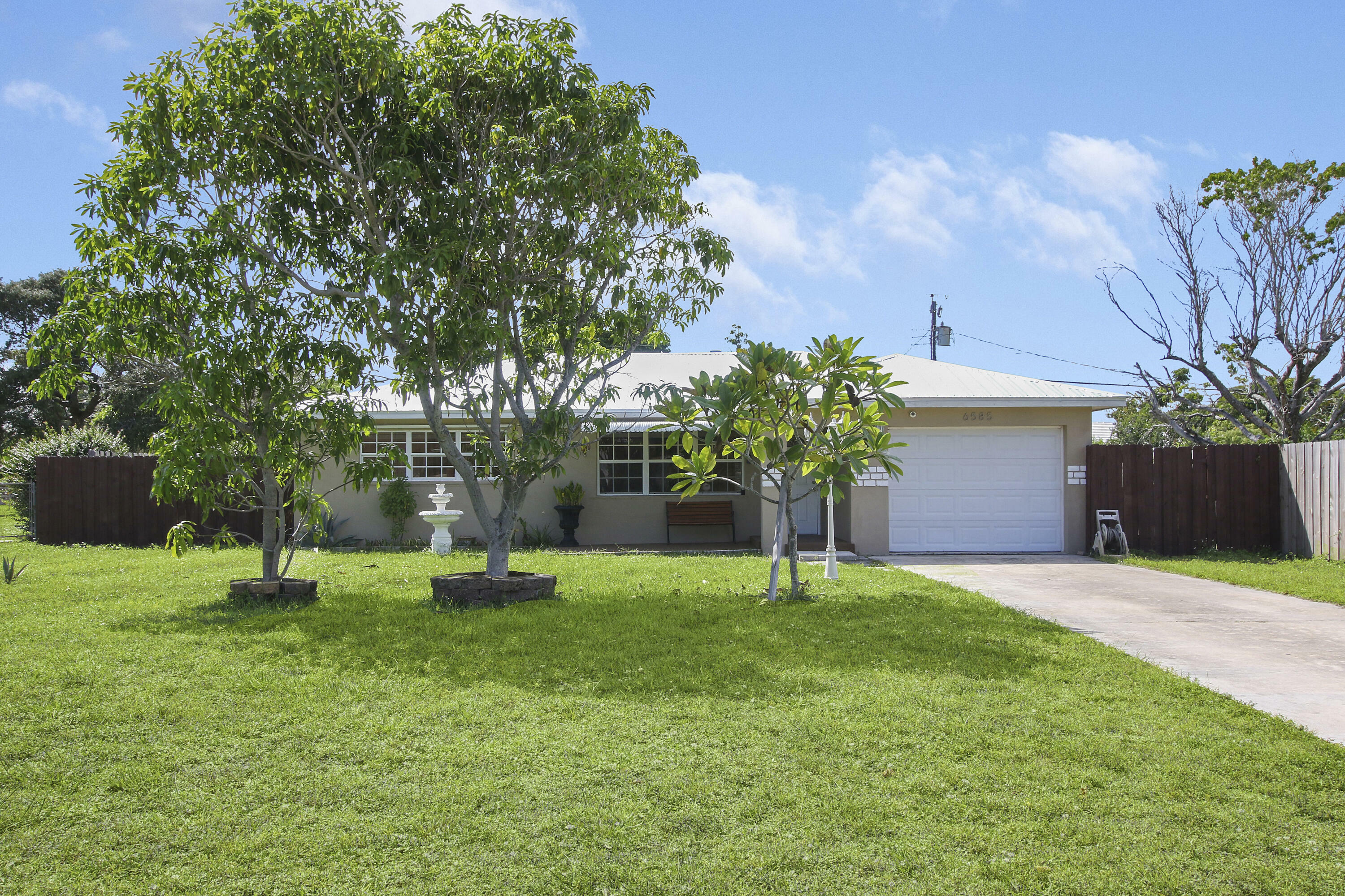 Property Photo:  6585 Osborne Drive  FL 33462 