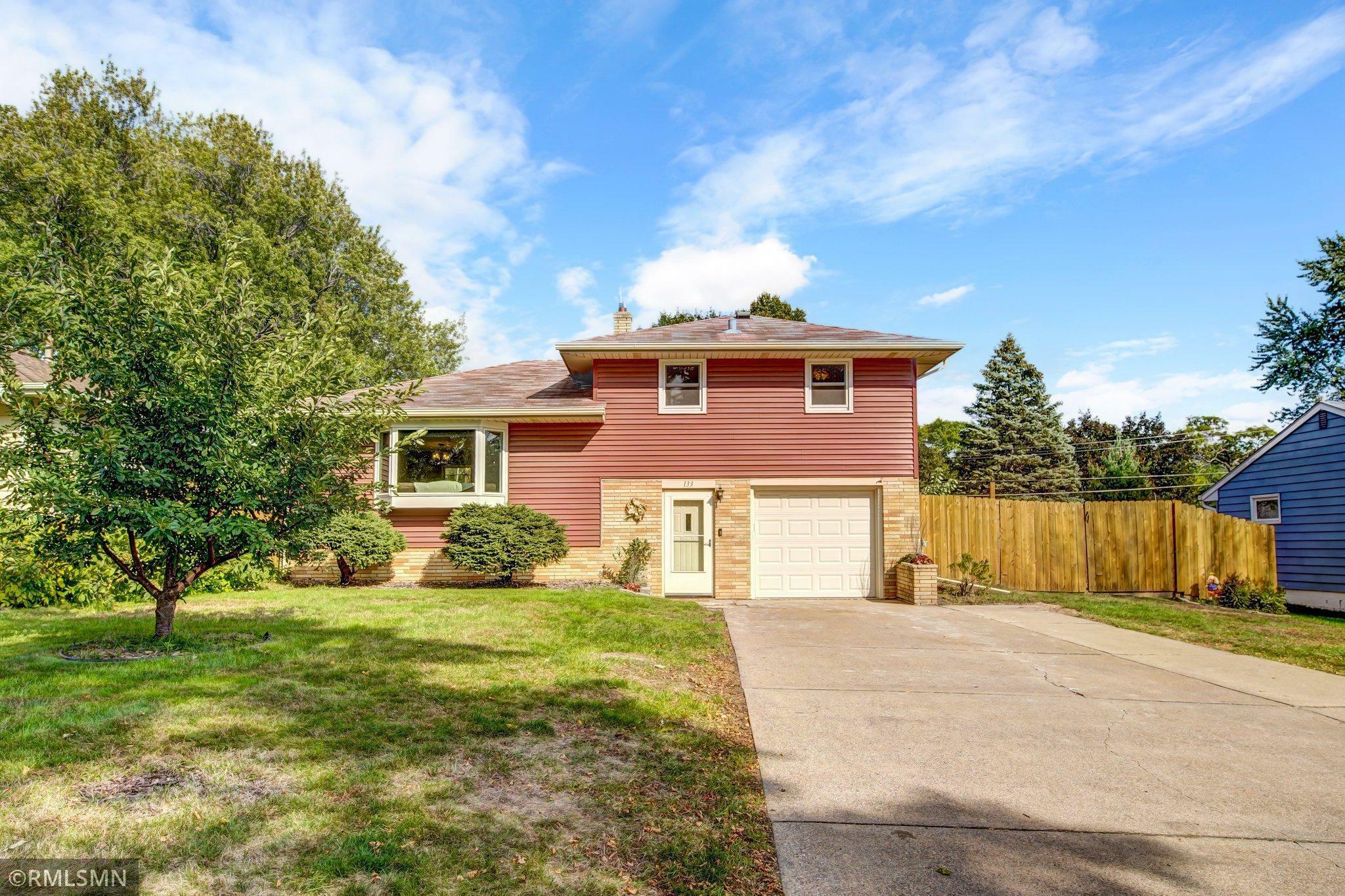 Property Photo:  133 Grenadier Avenue N  MN 55128 