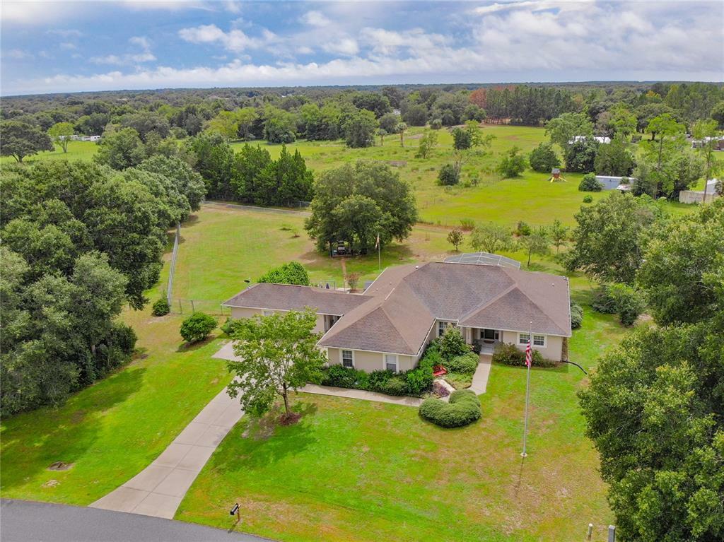 Property Photo:  25449 Rolling Oak Road  FL 32776 