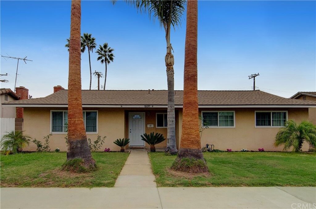 Property Photo:  18091 Newland Street  CA 92646 