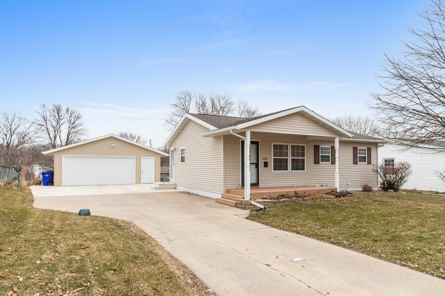 Property Photo:  5764 Langdon Avenue SW  IA 52404 