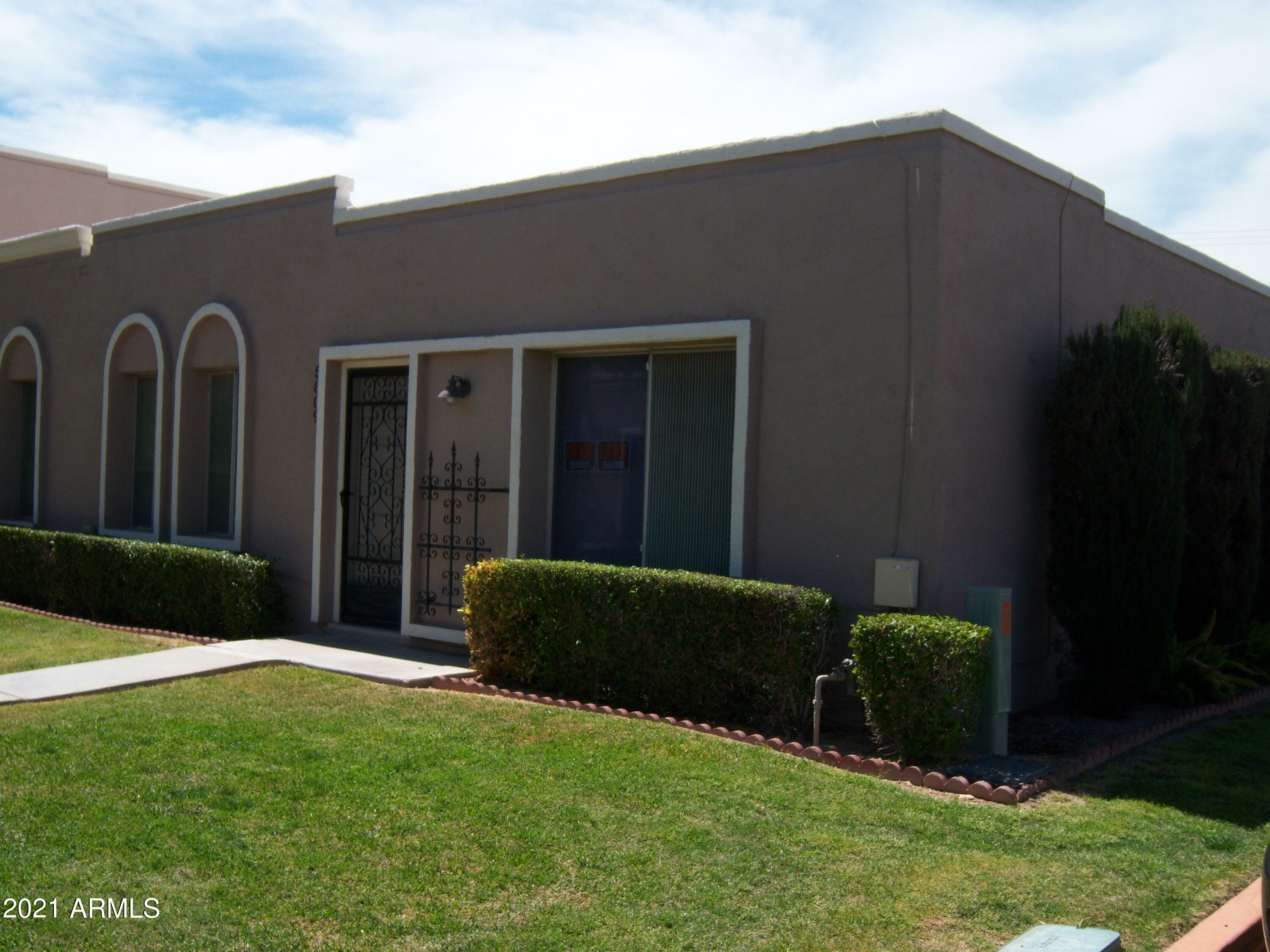 Property Photo:  5809 E Thomas Road  AZ 85251 