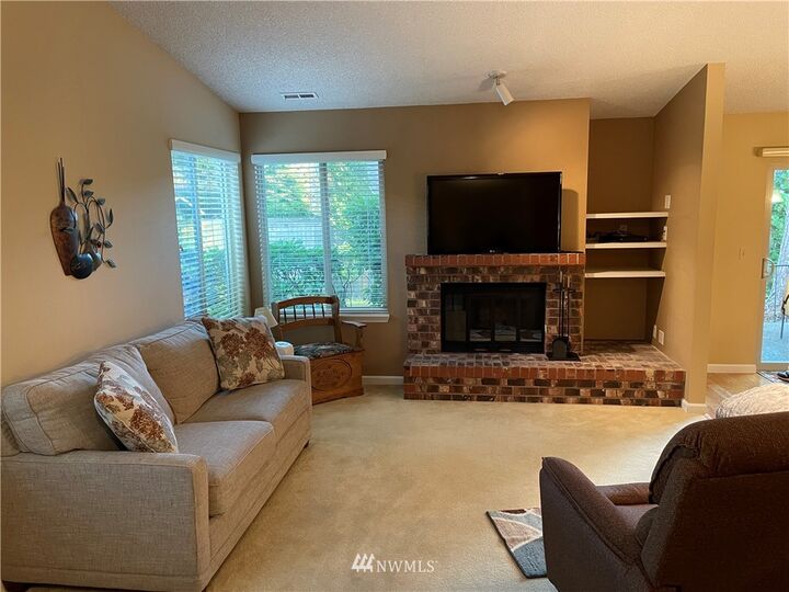 Property Photo:  16002  Village Green Drive A  WA 98012 