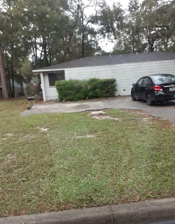 Property Photo:  703 SW 69th Street  FL 32607 