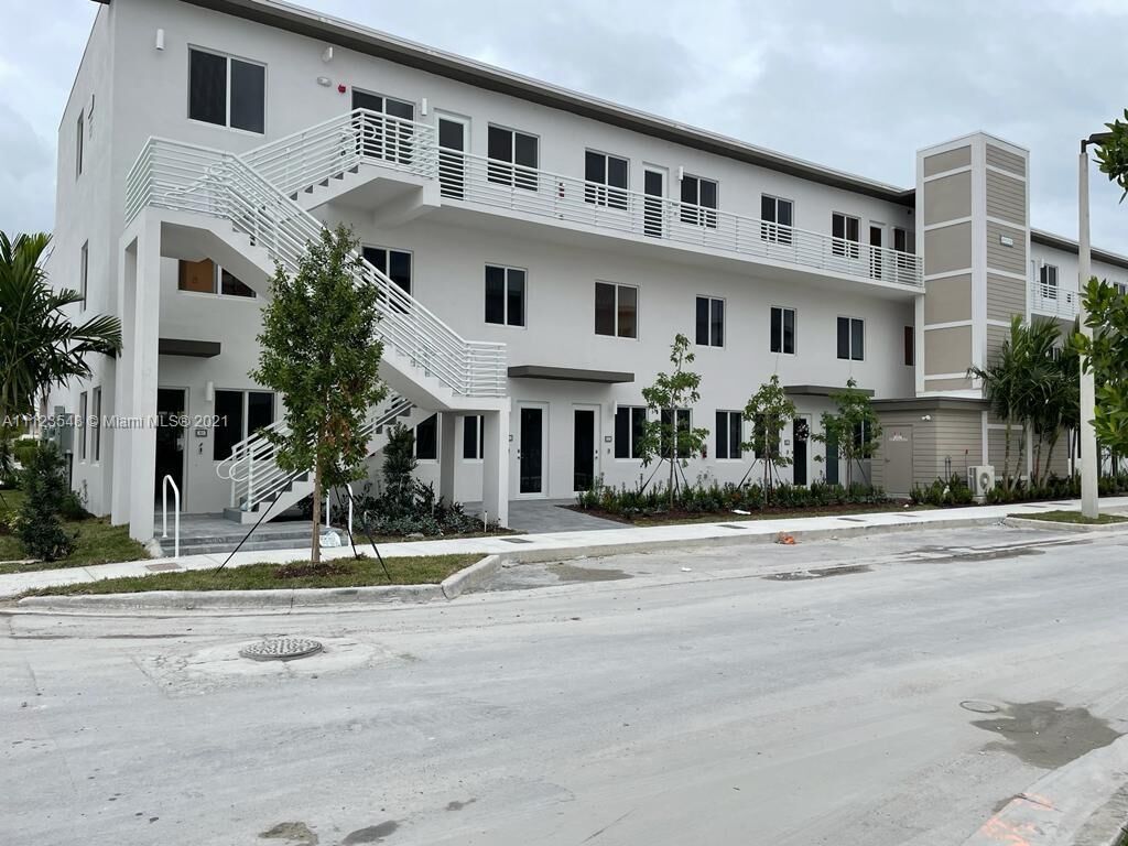 Property Photo:  6453 NW 102 Path 301  FL 33178 