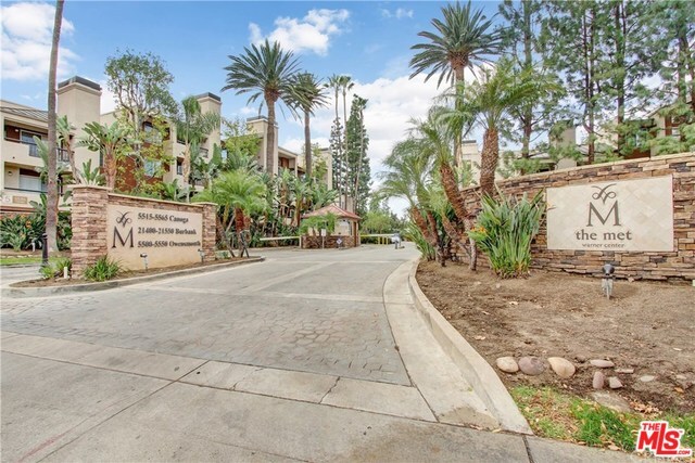Property Photo:  21520  Burbank 313  CA 91367 
