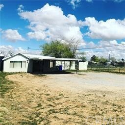 Property Photo:  11962 White Ave  CA 92301 