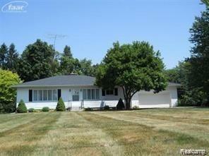 Property Photo:  6286 Calkins  MI 48532 3241 