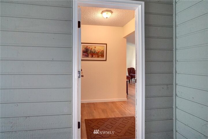 Property Photo:  14401 SE Petrovitsky Road E 206  WA 98058 