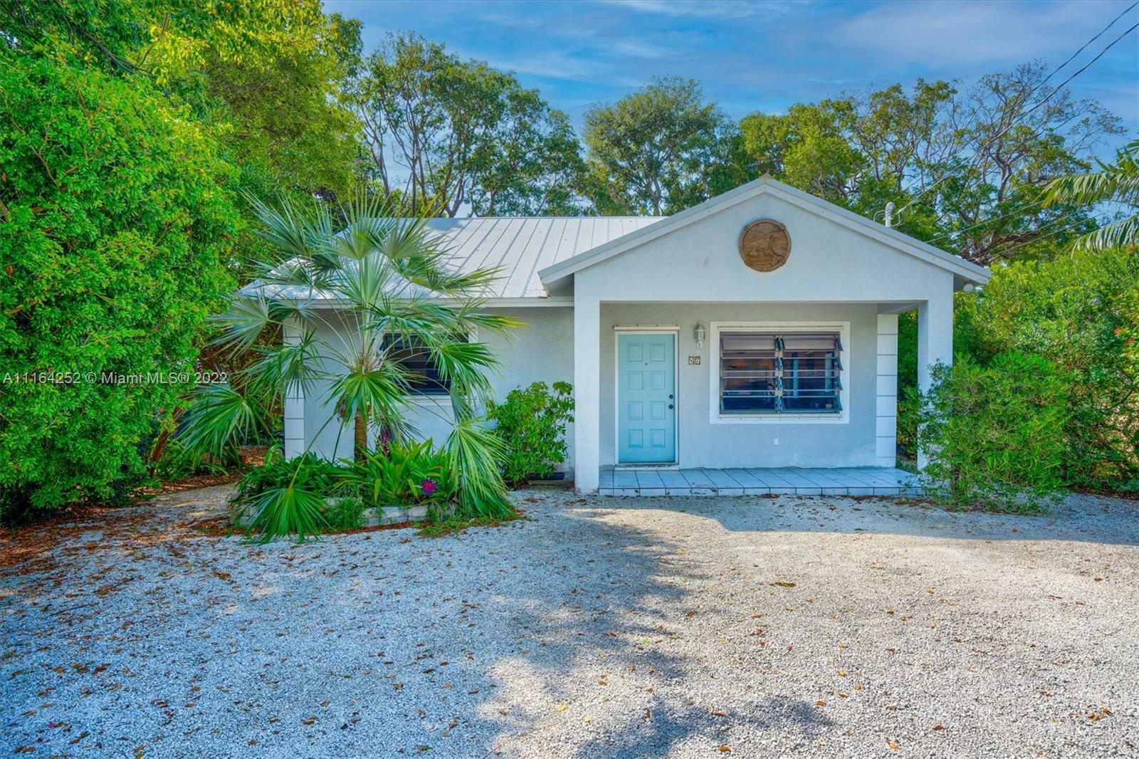 Property Photo:  47 Bass Ave  FL 33037 