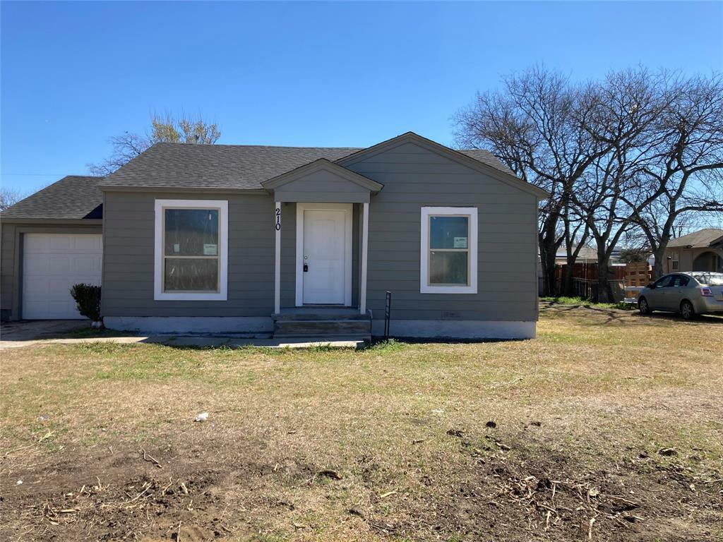 Property Photo:  210 NW 16th  TX 75050 