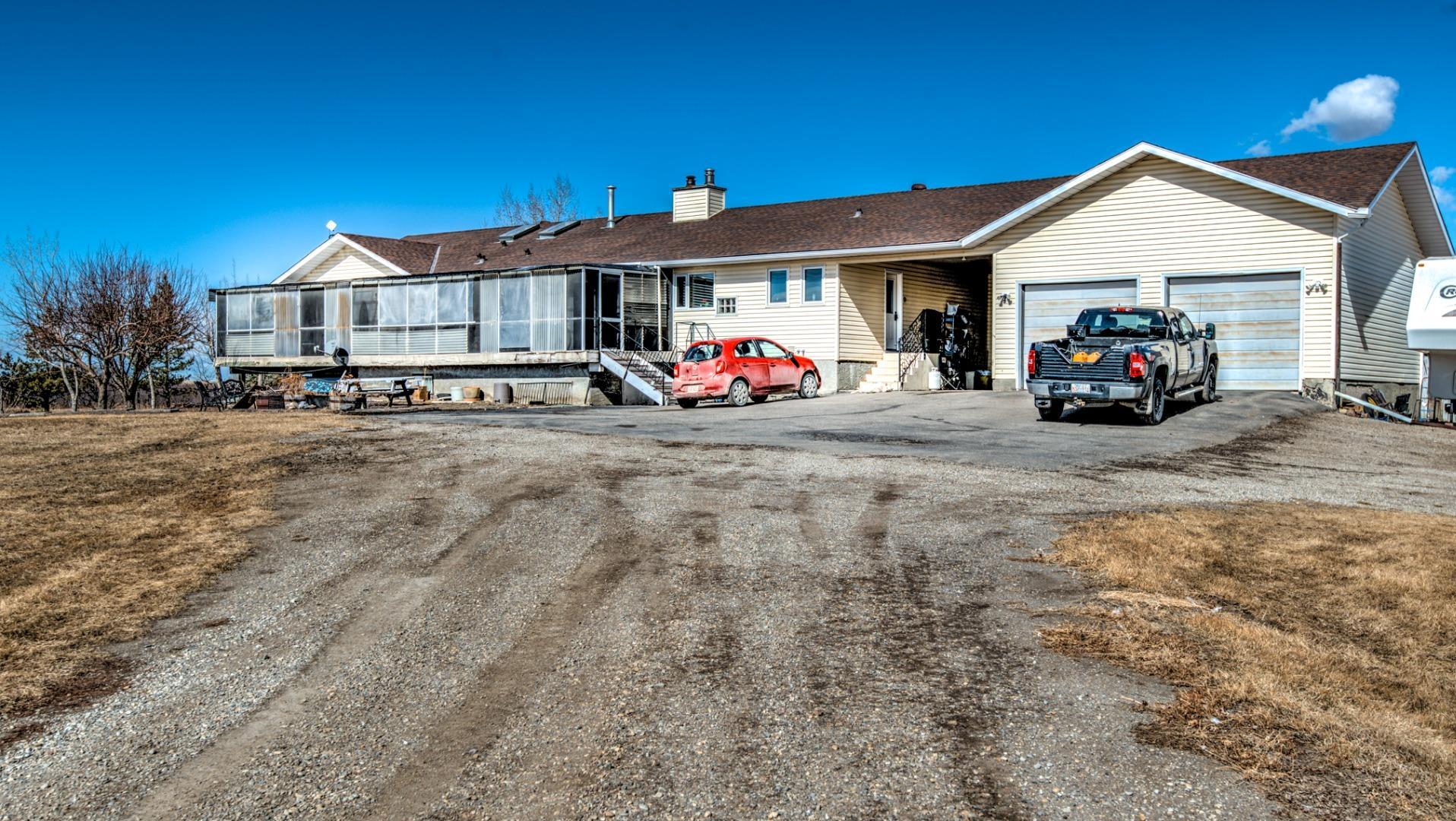 Property Photo: 272144 Inverlake Road AB T1Z 0V8