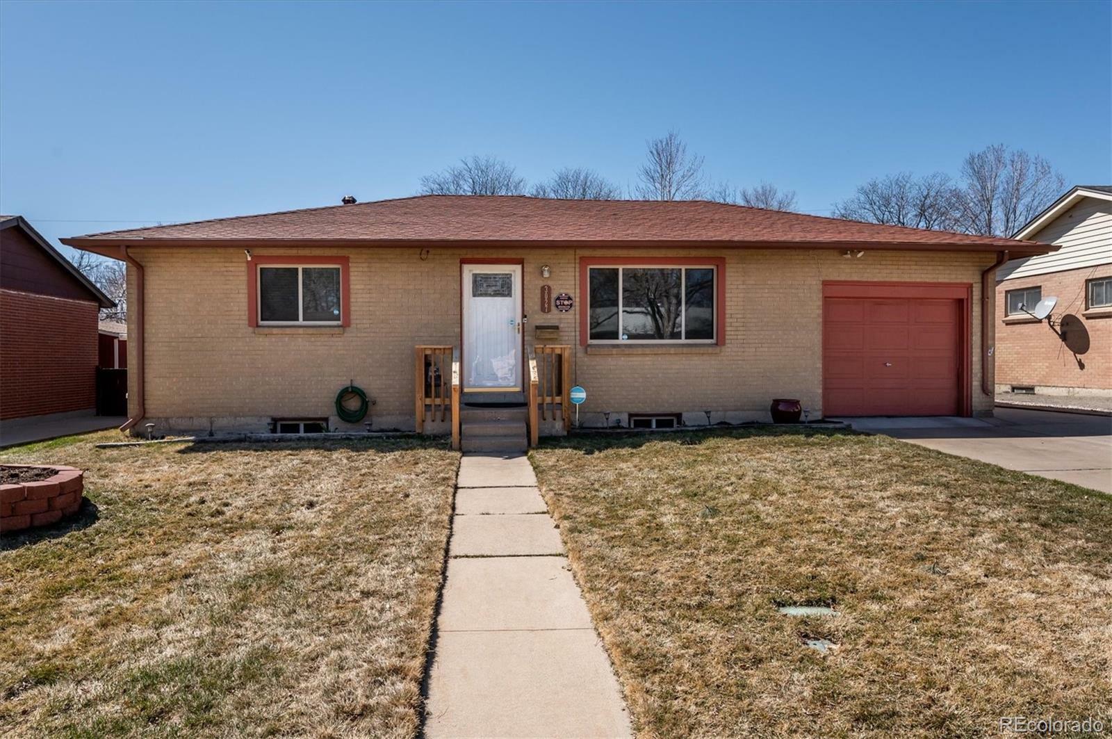 Property Photo:  3027 S Wolff Street  CO 80236 