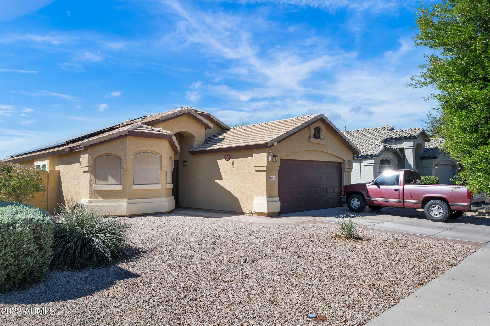 Property Photo:  16187 W Latham Street  AZ 85338 