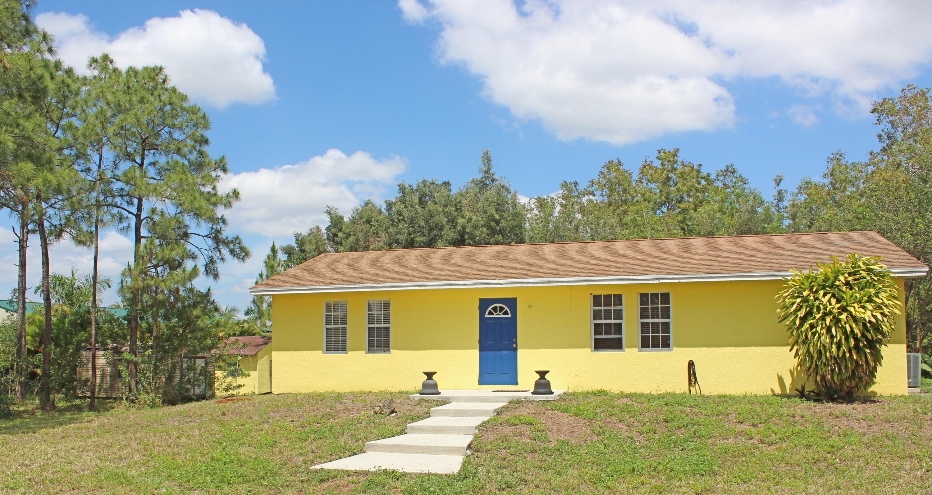 Property Photo: 13433 Tangerine Boulevard FL 33412