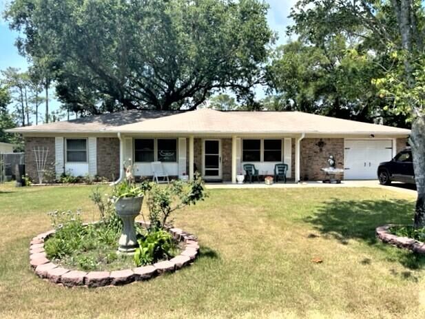 Property Photo:  1904 Palmetto Palm Circle  FL 32578 