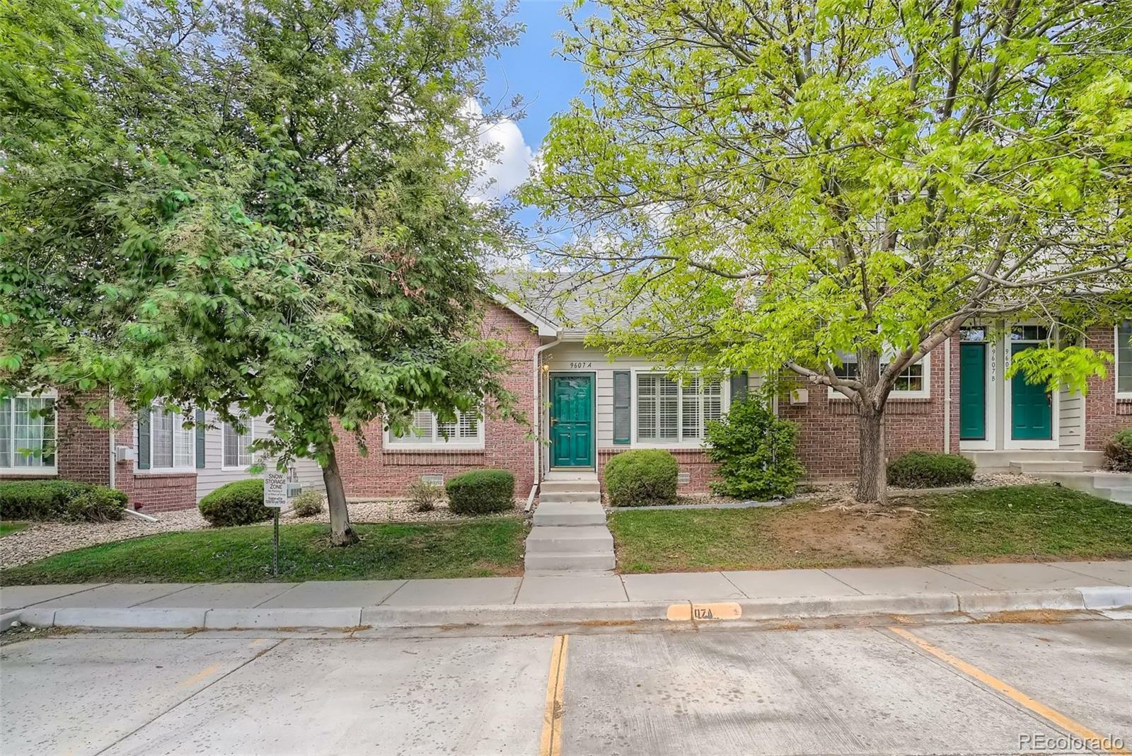 Property Photo:  9607 W Chatfield Avenue A  CO 80128 