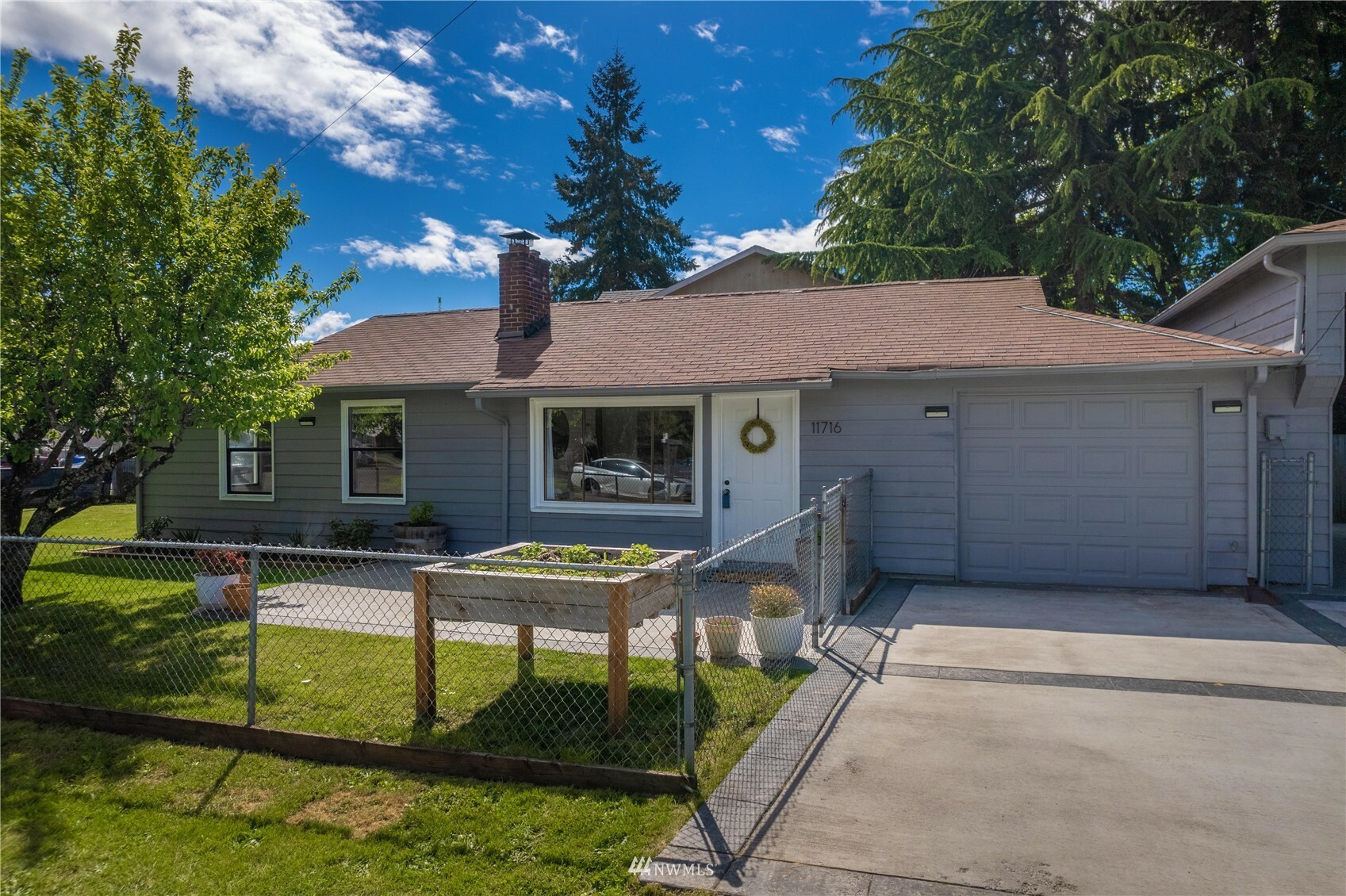 Property Photo:  11716 Sheridan Avenue S  WA 98444 