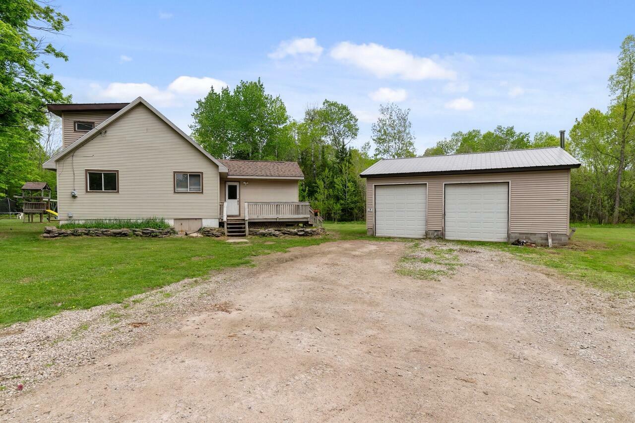 Property Photo:  4387 Quarry Road  MI 49705 