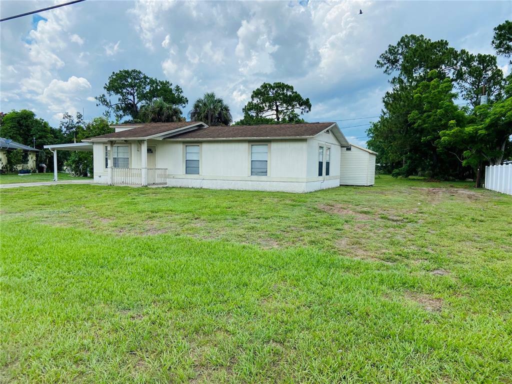 Property Photo:  703 E 3rd Street  FL 33936 